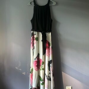 Black and white floral dress with empire waist tie keyhole back and bow. Perfect